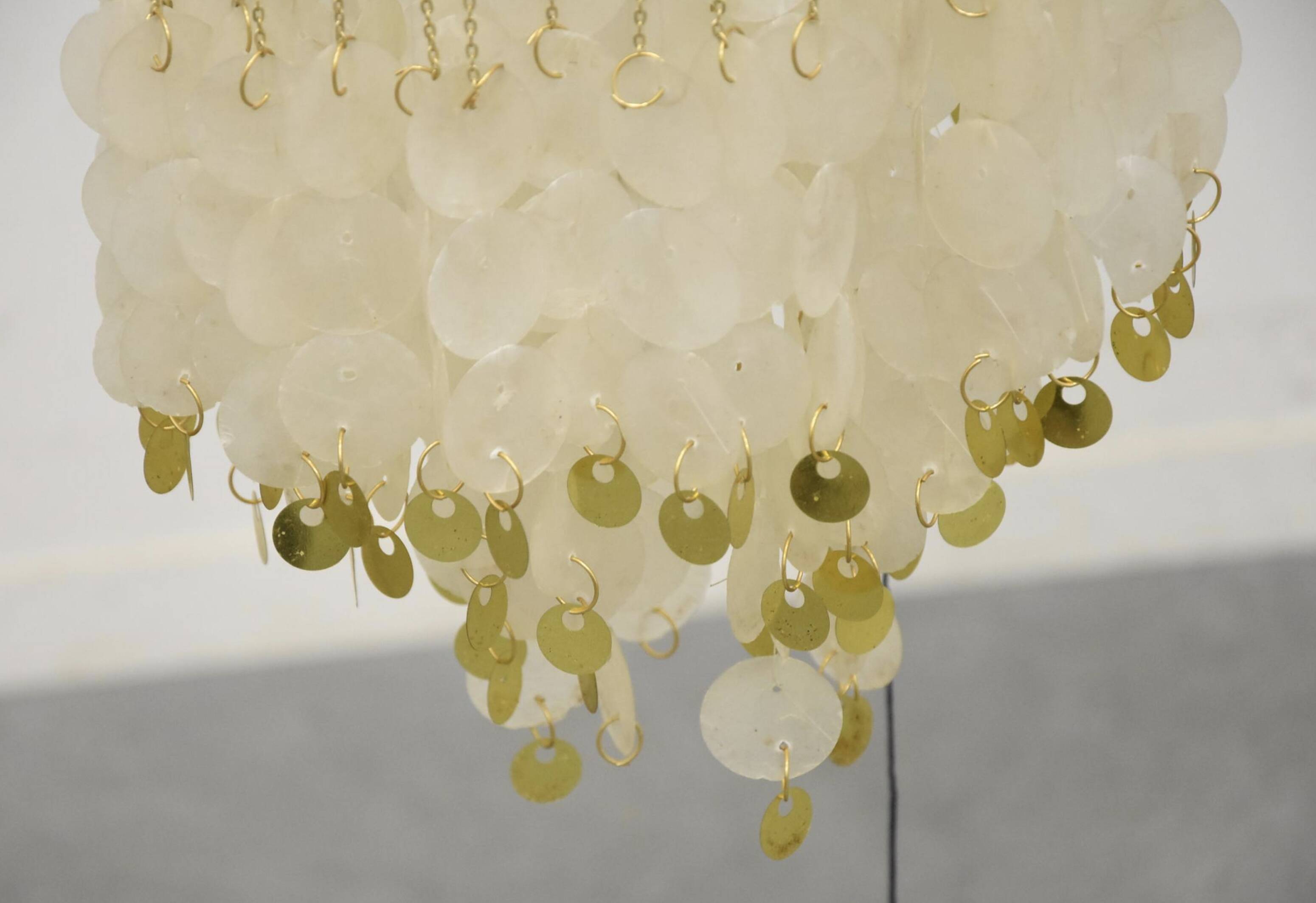 Suspension en pastille de nacre