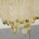 Suspension en pastille de nacre