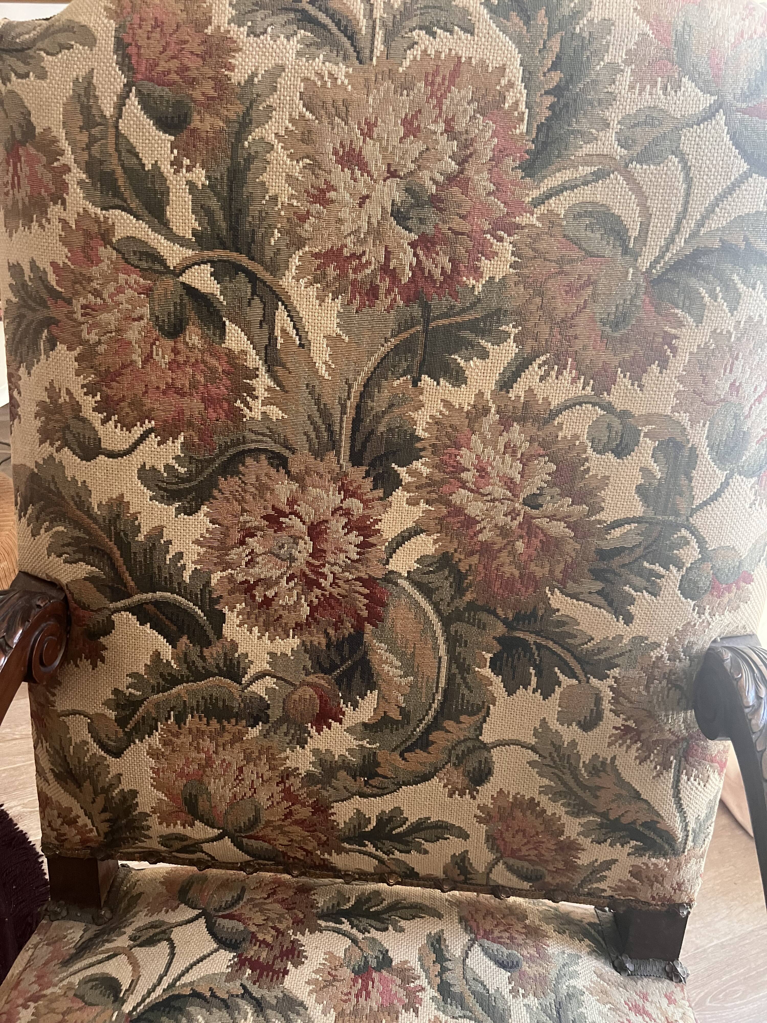 Antique armchair in Henri II style with masks