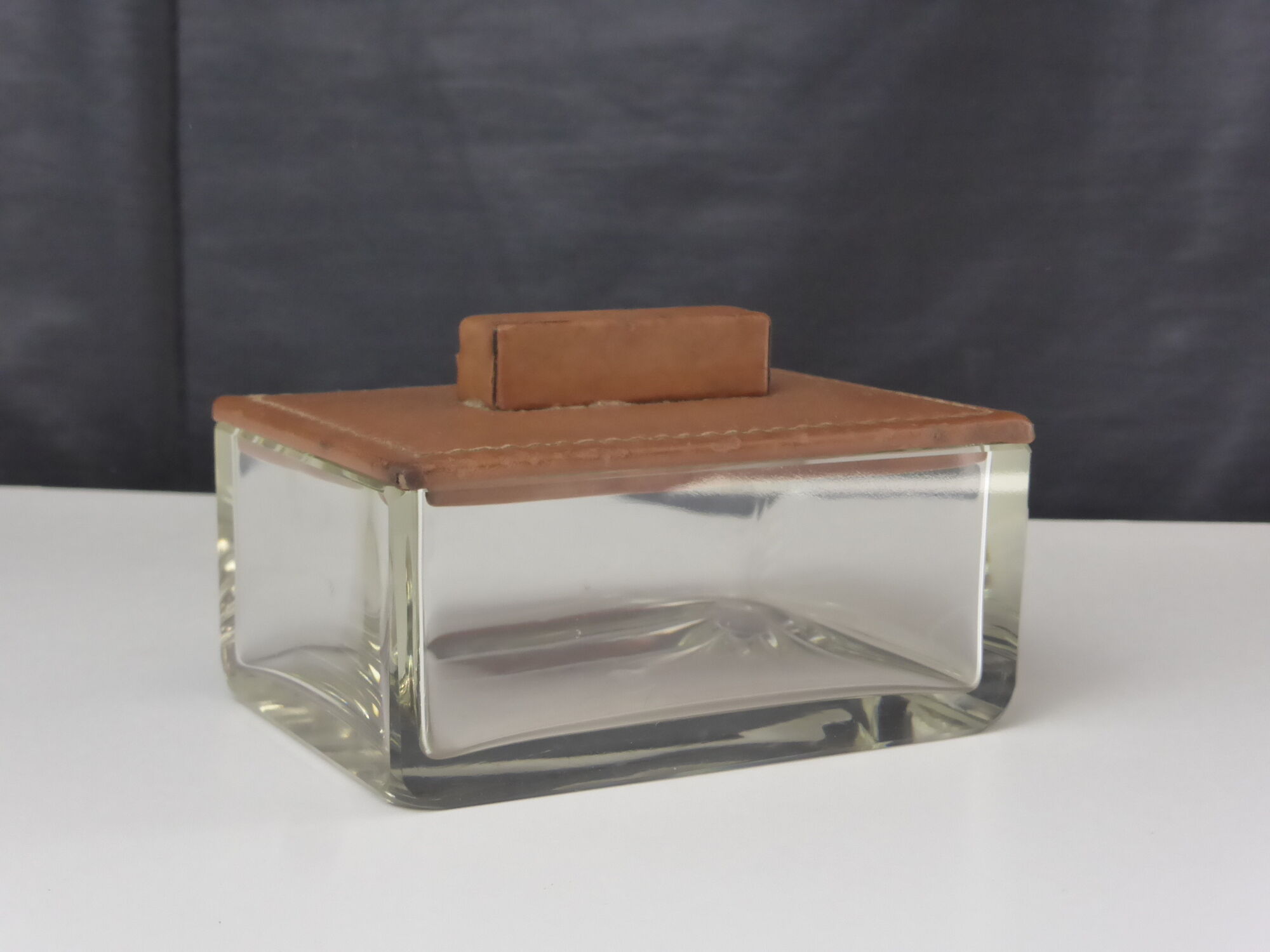 Vintage glass box with tawny leather lid