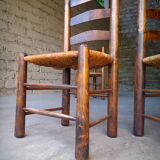 Set of 4 straw-covered brutalist chairs by George Robert