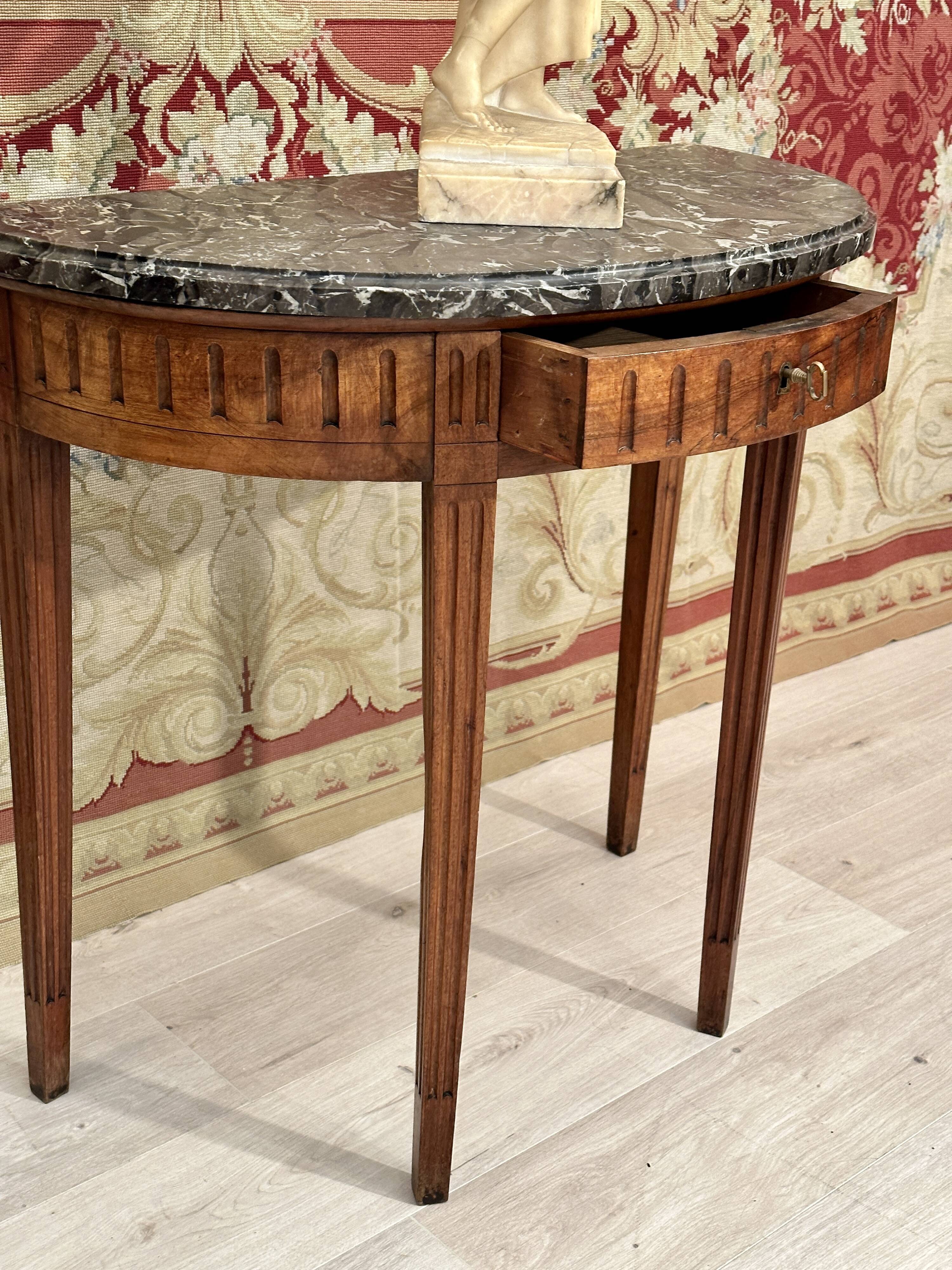 Half-moon console in walnut period Louis XVI around 1770