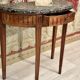 Half-moon console in walnut period Louis XVI around 1770