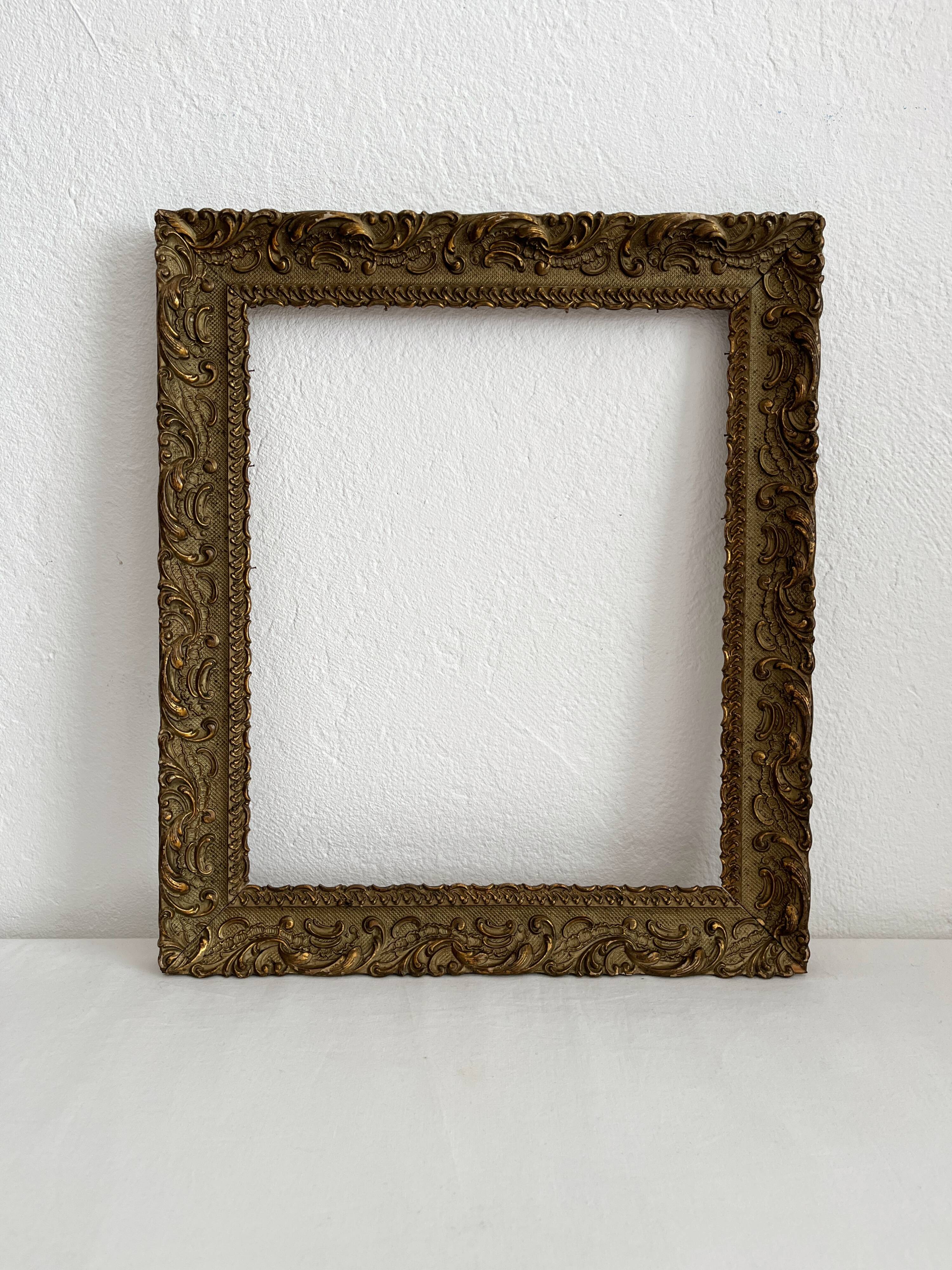 Old frame in gilded wood with stucco decoration circa 1900