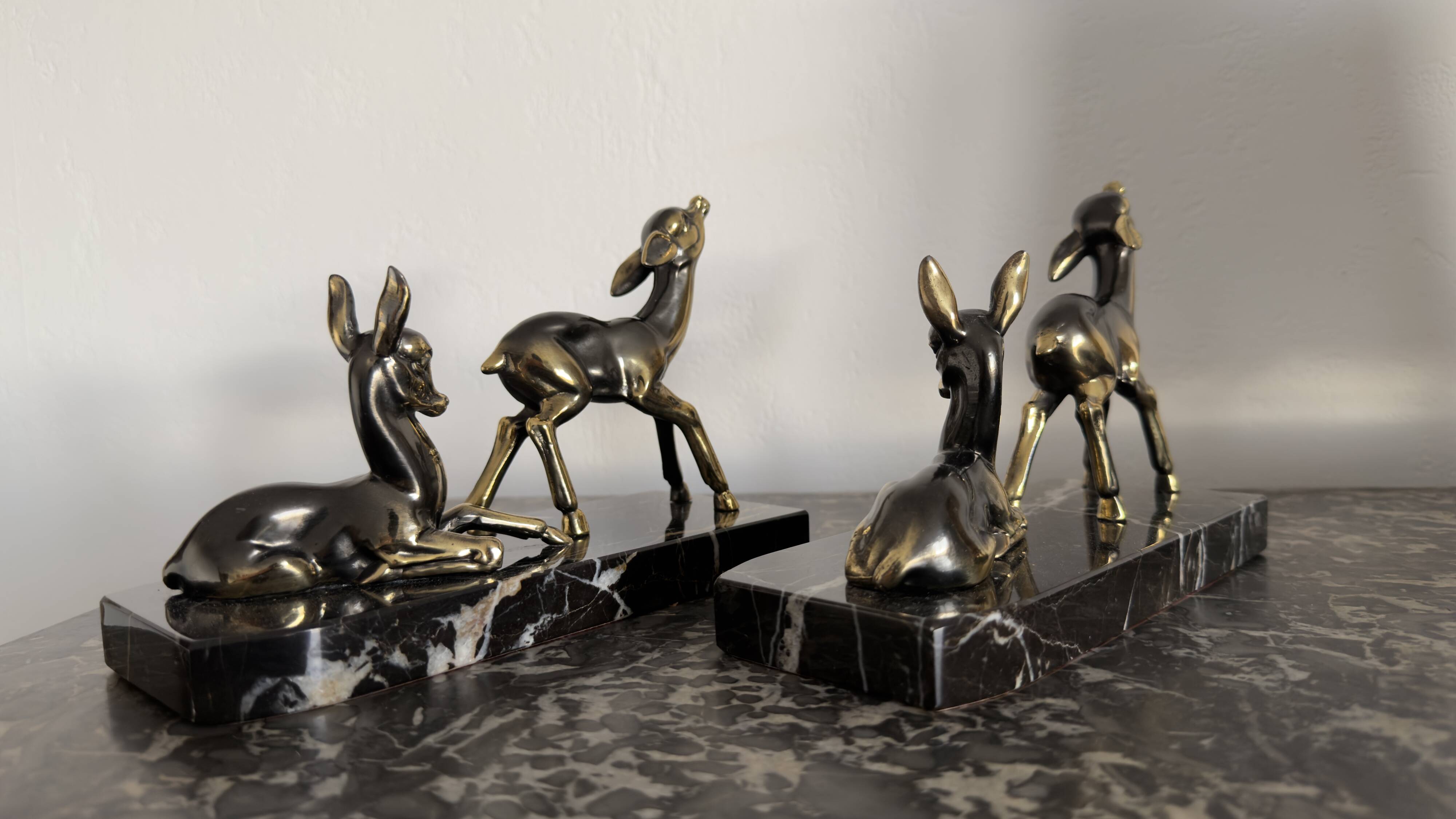 Art Deco bookends "Doe & Fawn" in black marble and gold metal