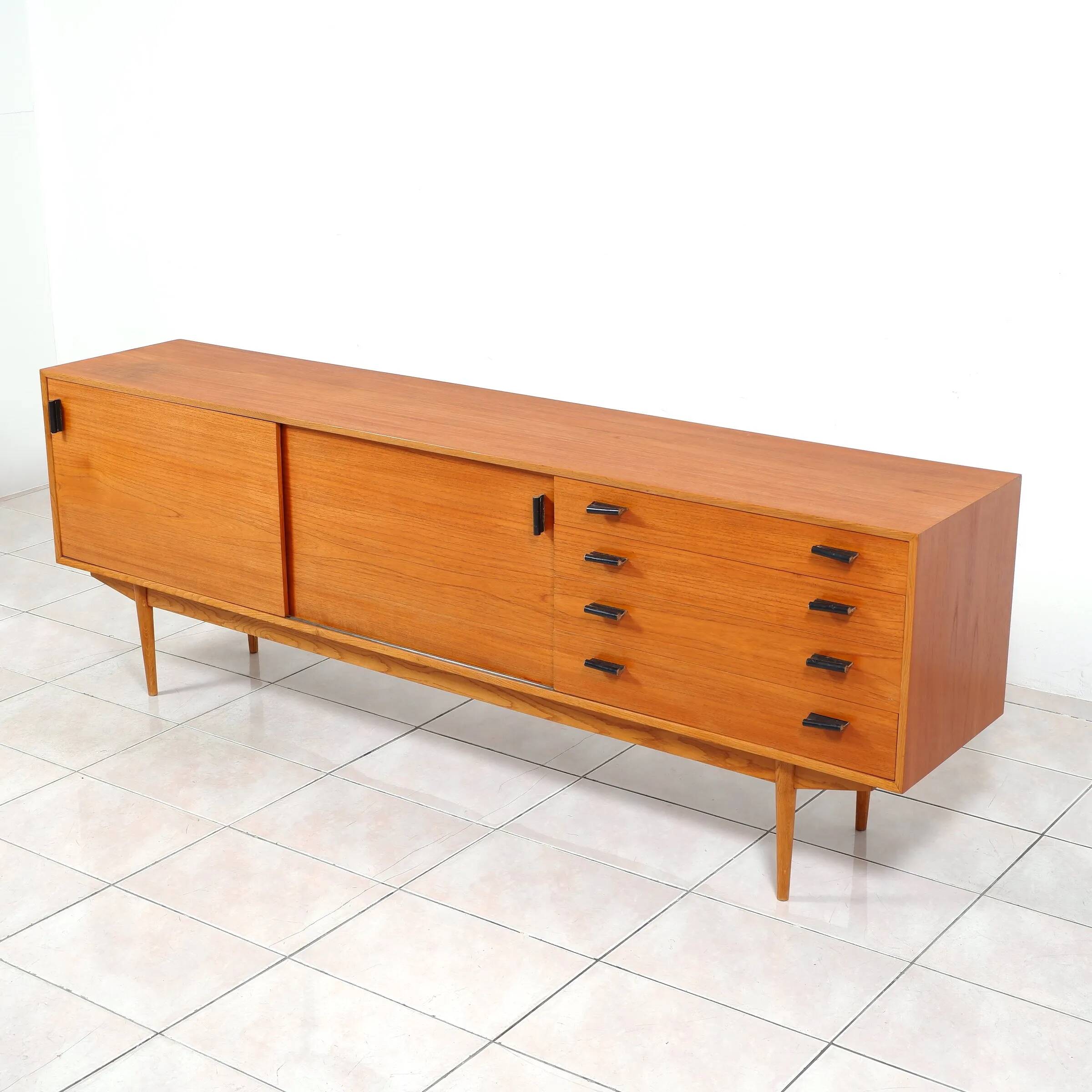 Swedish teak sideboard with leather handles