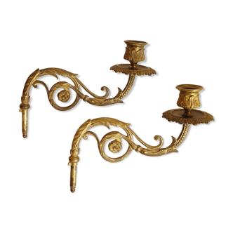 Paire de chandeliers à pivot en bronze