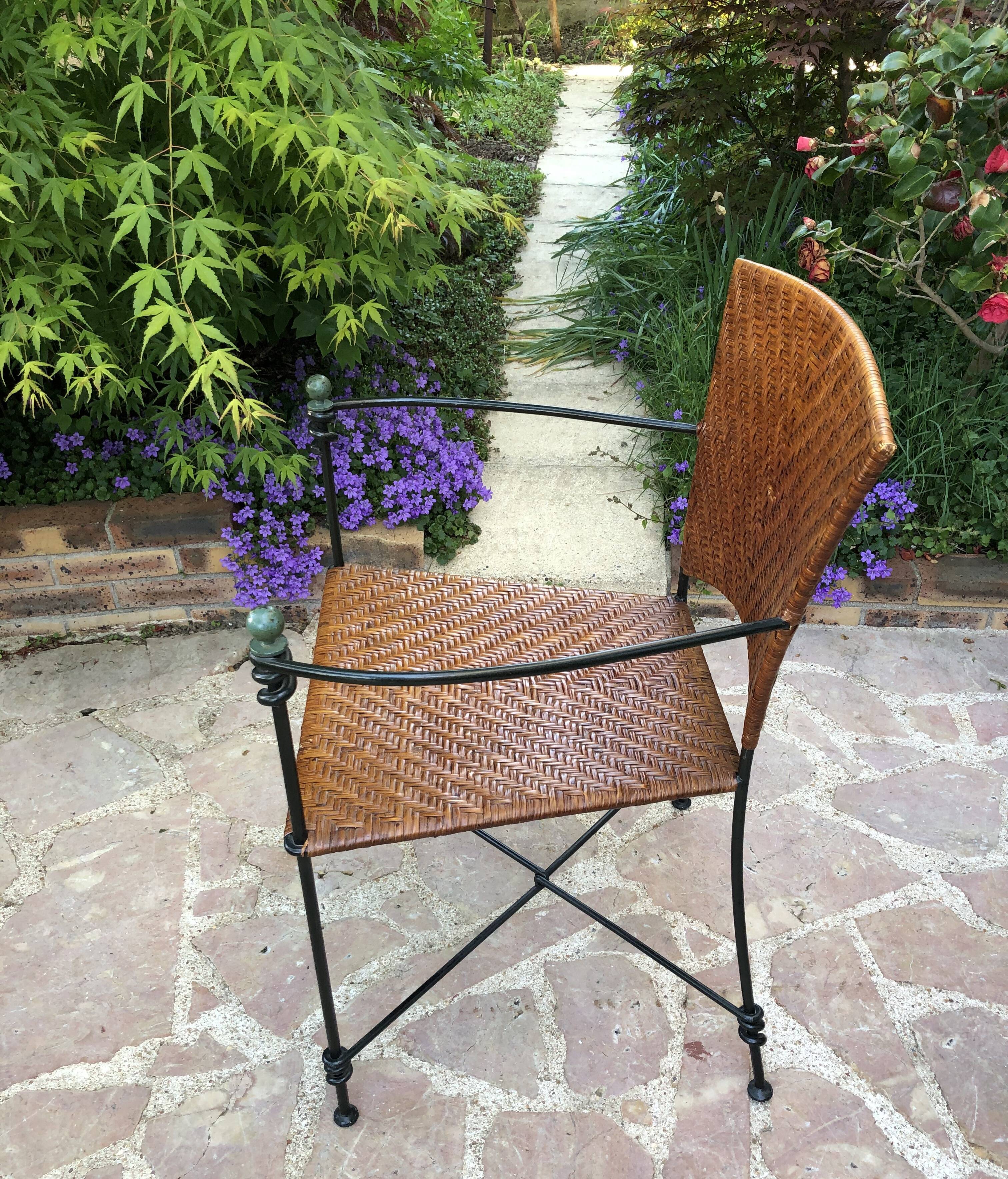 Paire de fauteuils vintage en fer forgé et osier