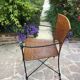Paire de fauteuils vintage en fer forgé et osier