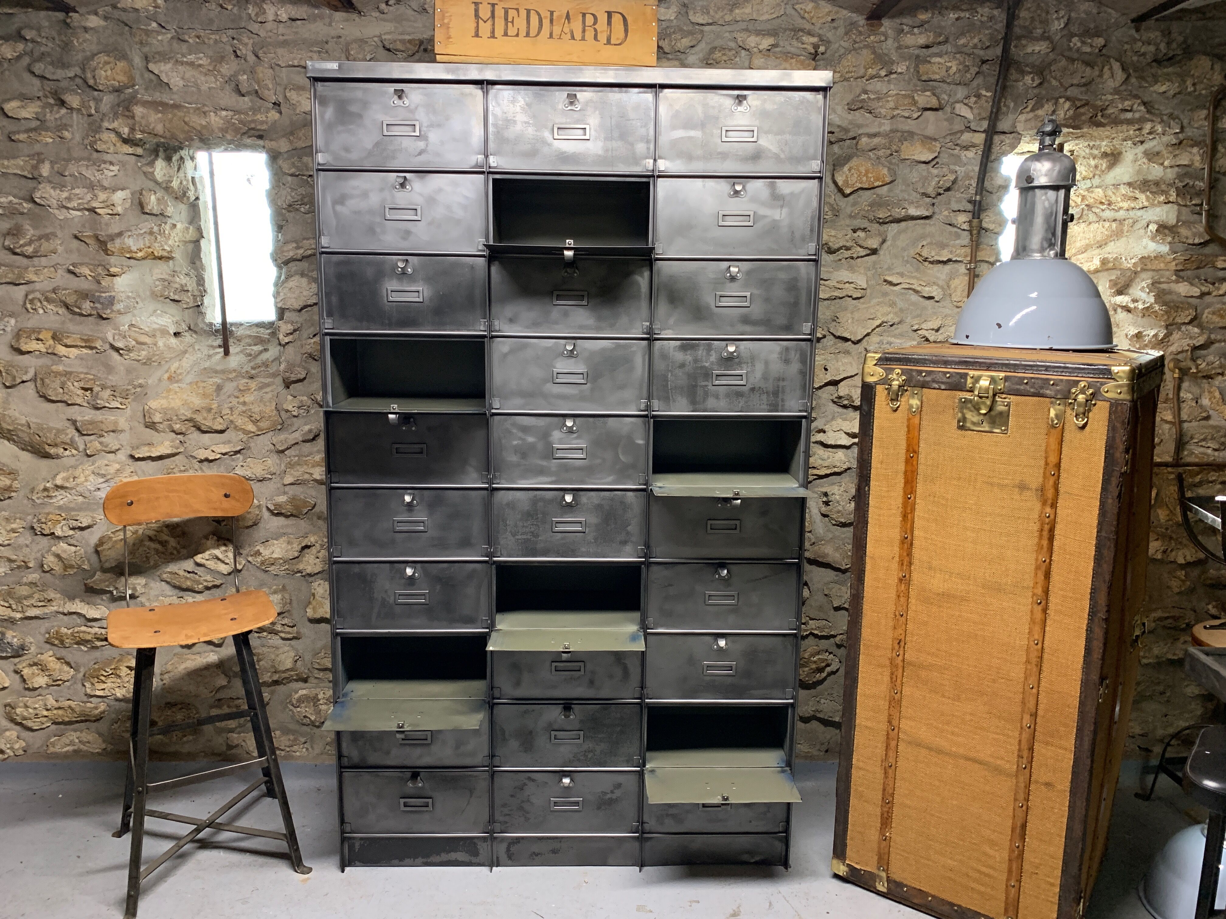Industrial cladding furniture in brushed and patinated steel