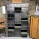Industrial cladding furniture in brushed and patinated steel