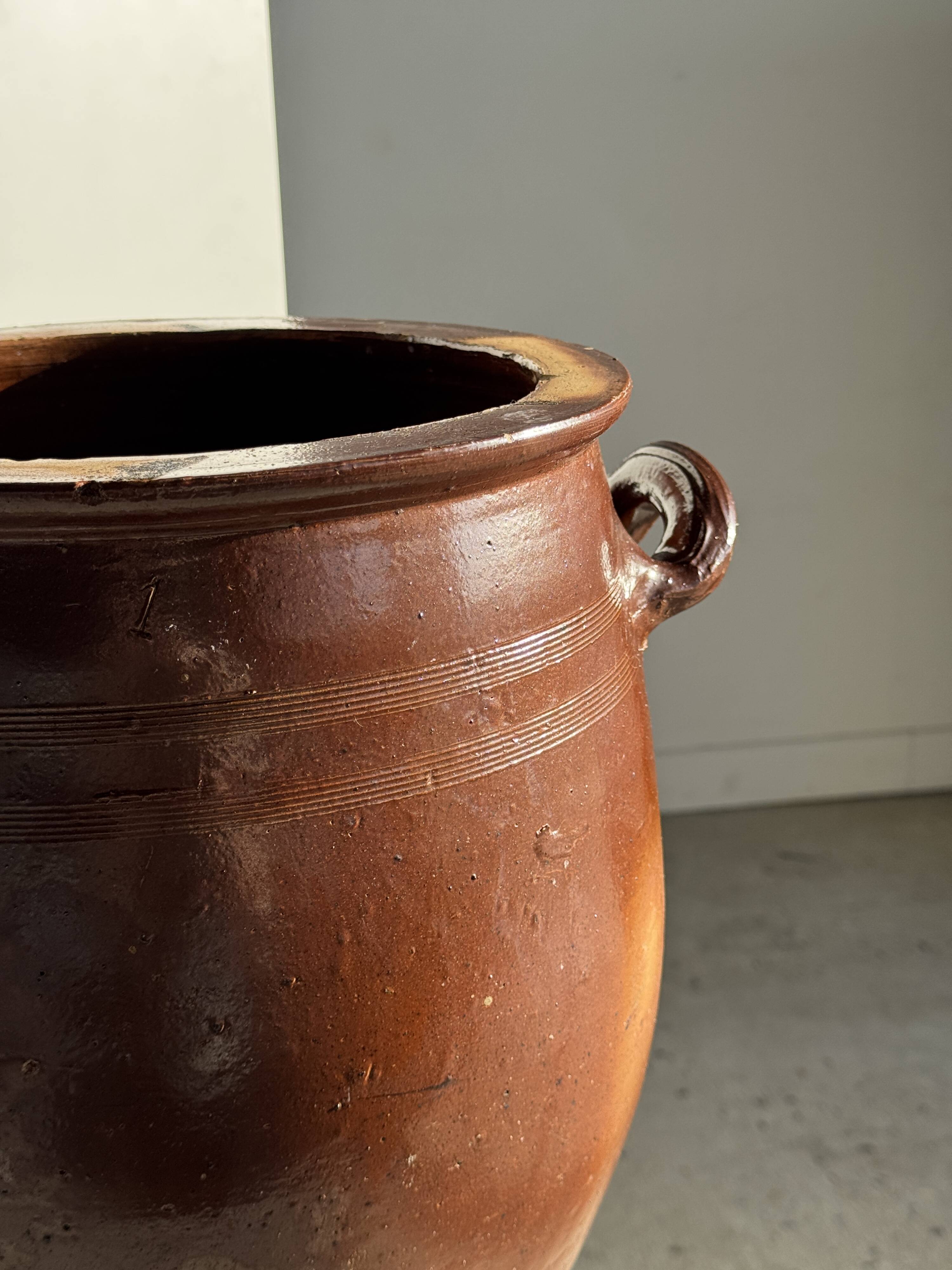 Very large glazed brown terracotta pot with two handles H41 D30