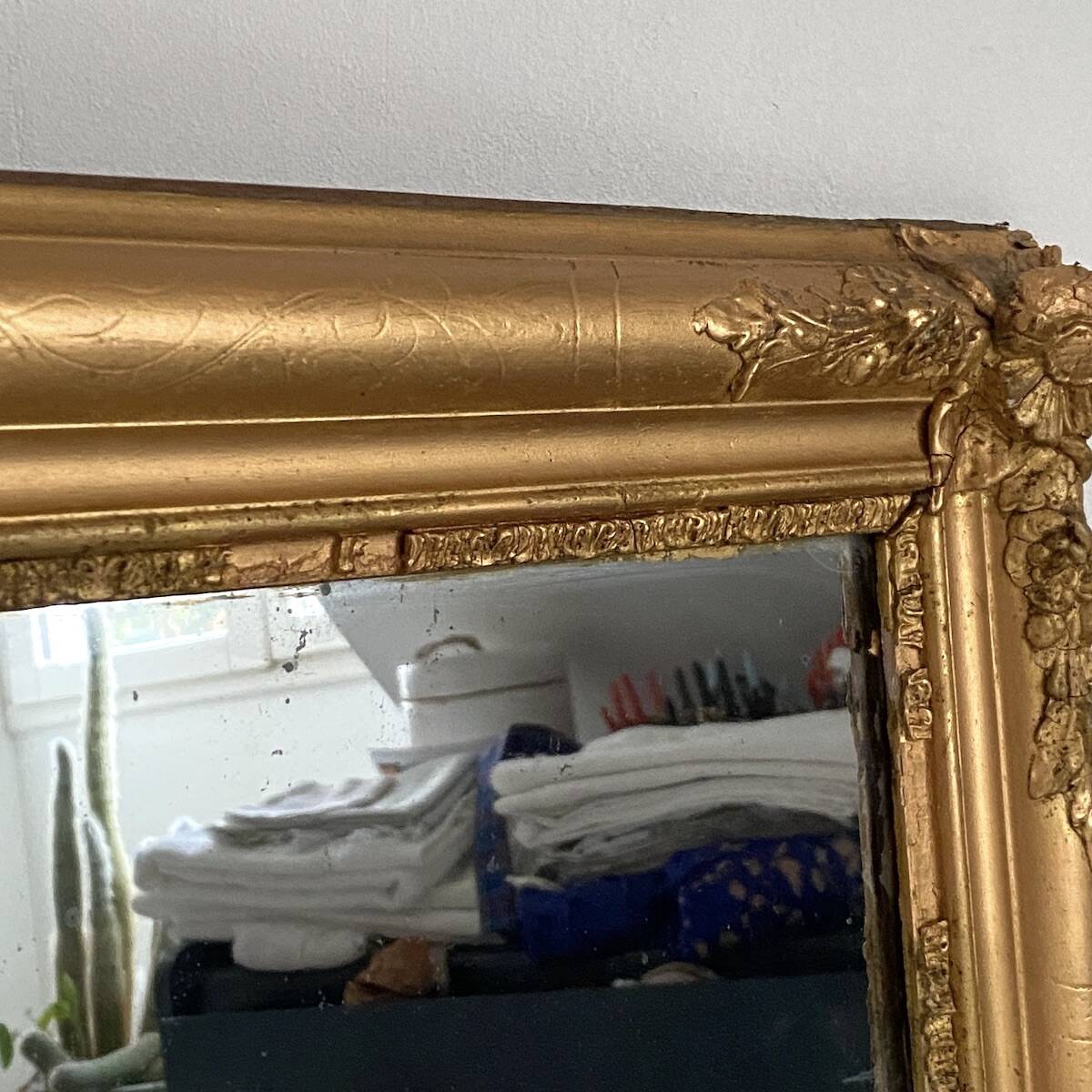 19th-century mercury mirror, in wood and gilded stucco