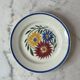 Flat plate with hand-painted floral decoration