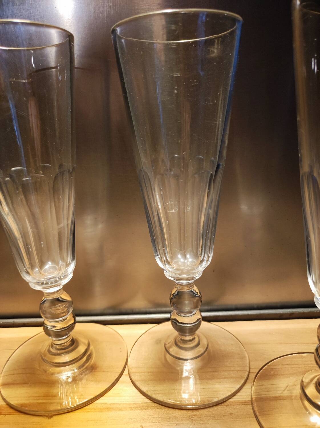 4 champagne flutes with cut sides, late 19th century