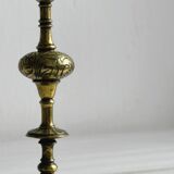Carved brass candlestick holder