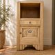 Small Art Deco bedside table in light wood with a terrazzo effect top.