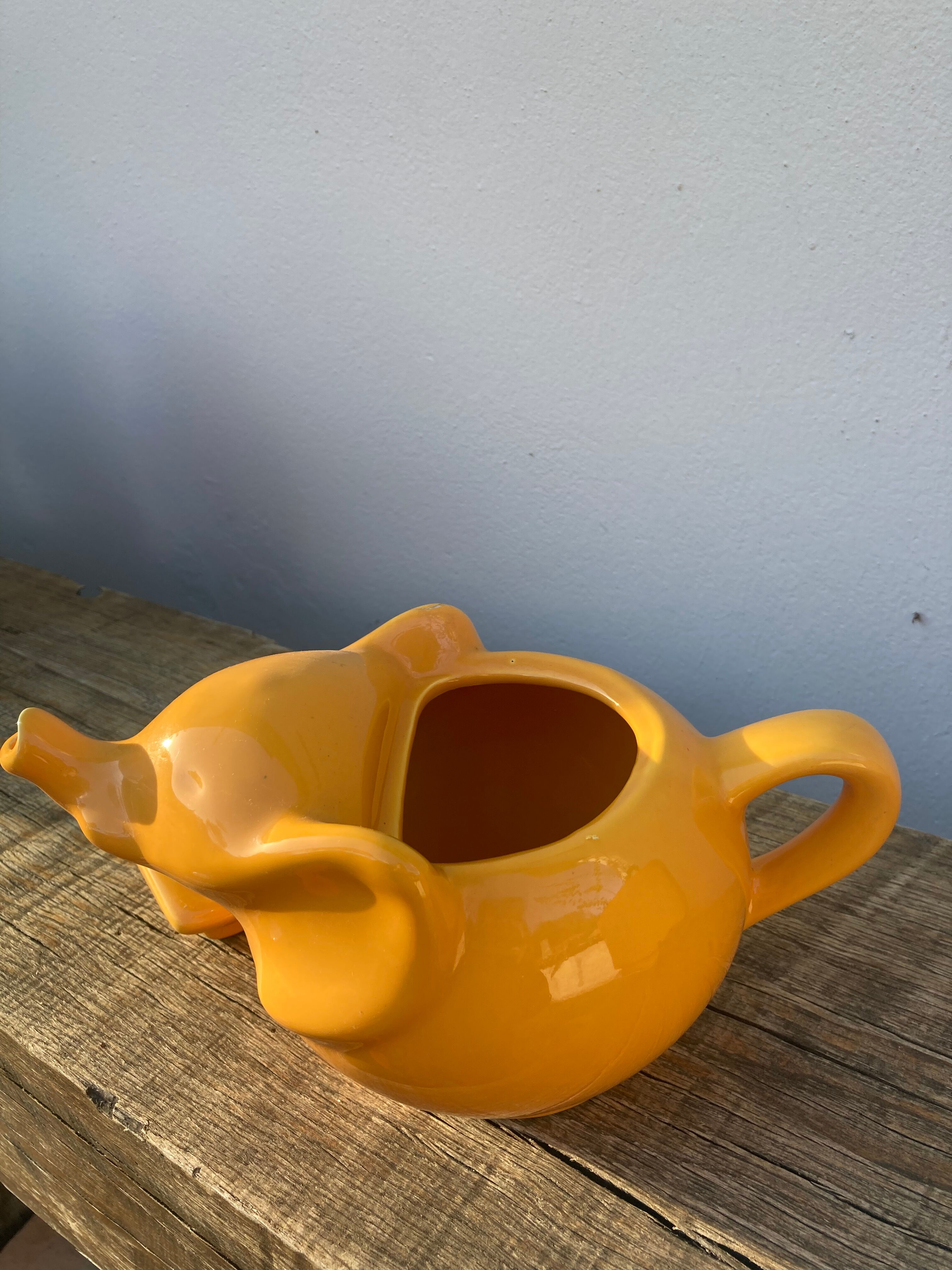 Yellow ceramic elephant teapot