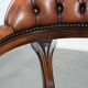 Classic and timeless cow leather and wooden Chesterfield office chair
