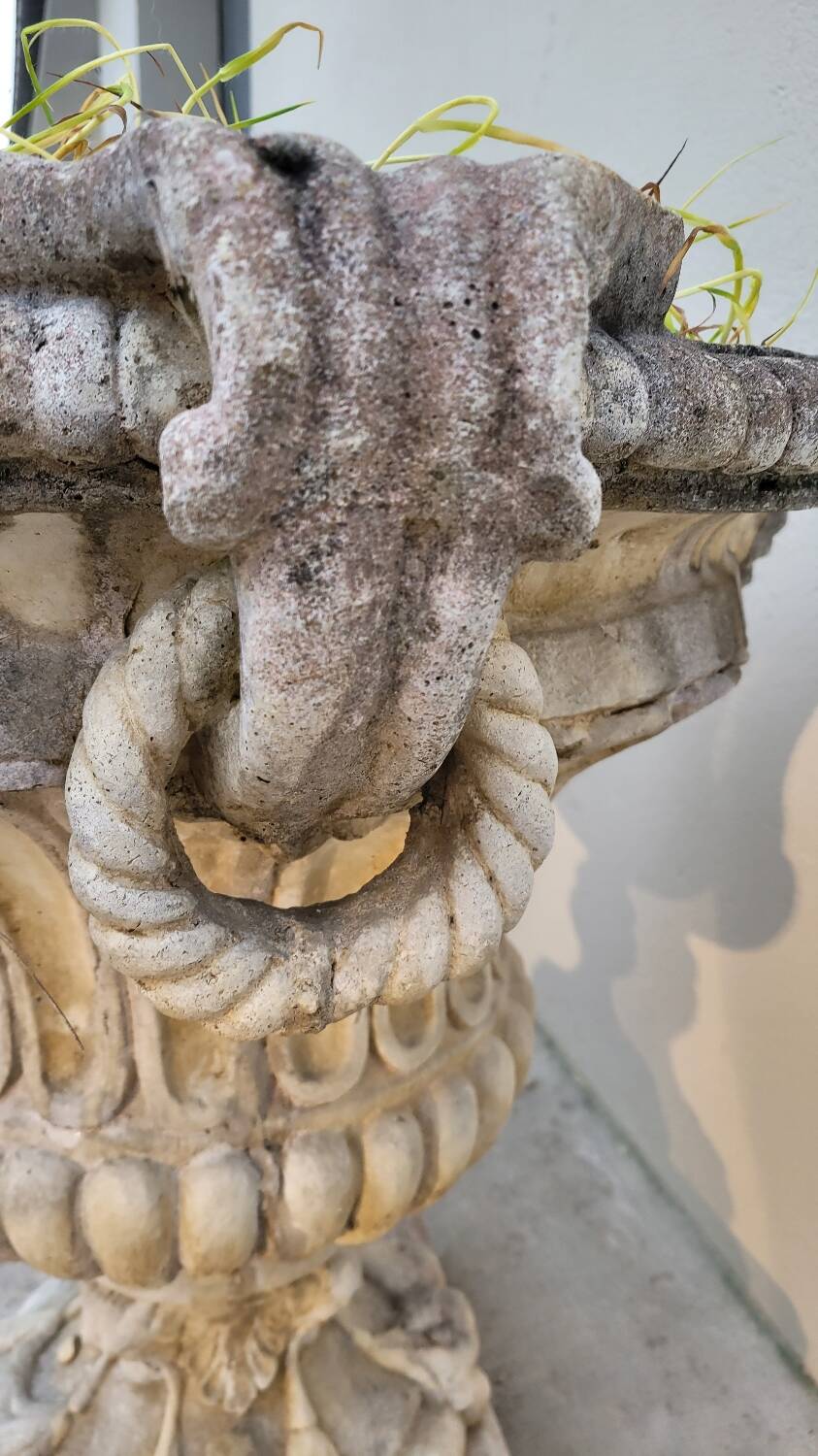 Pair of planter vases decorated with faces in reconstituted stone 1950s