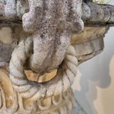 Pair of planter vases decorated with faces in reconstituted stone 1950s