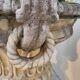 Pair of planter vases decorated with faces in reconstituted stone 1950s