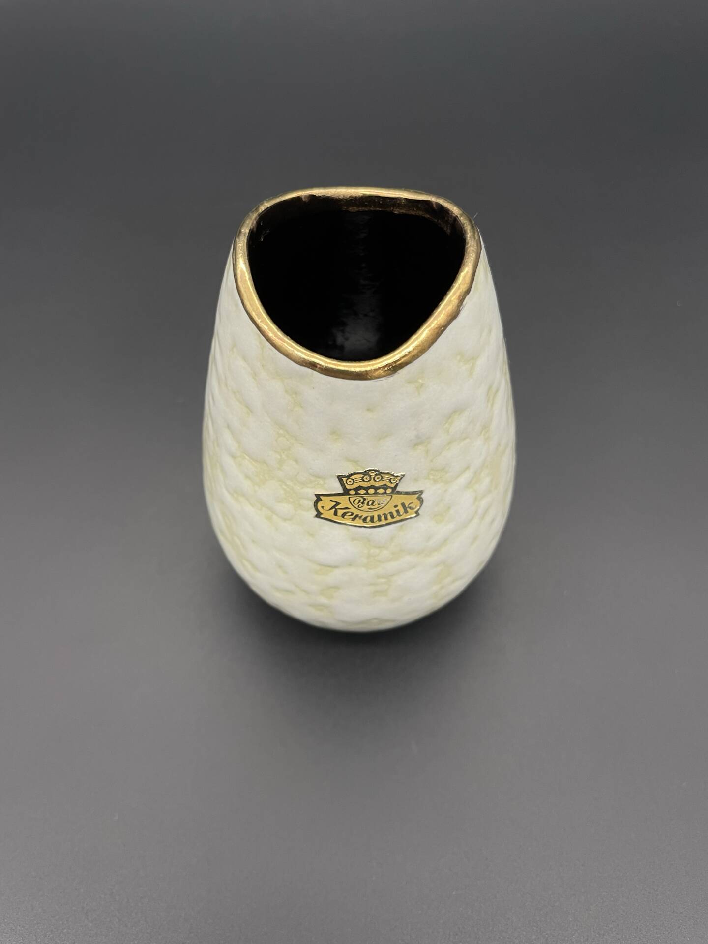 Small Bay Keramik vase with pearlescent glaze and gold trim.