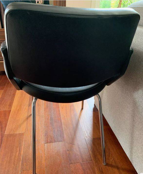Black leatherette conference armchair