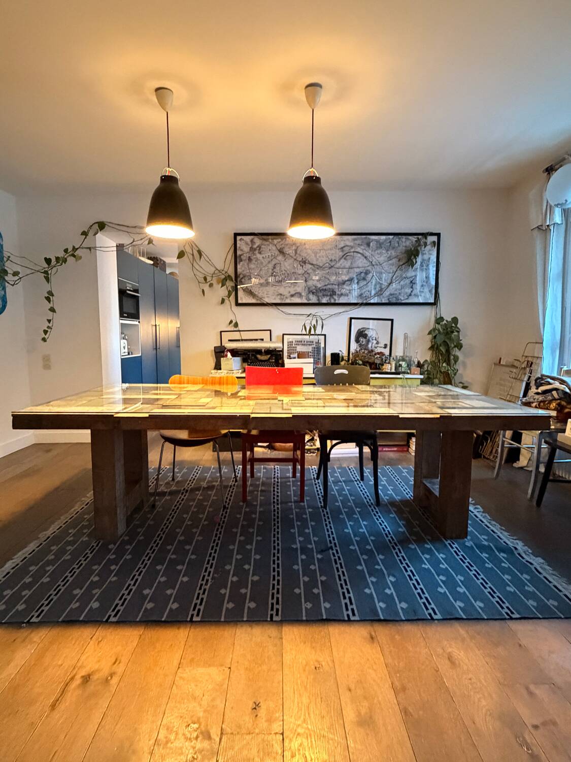 Magnificent wooden table with a glass top.