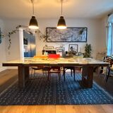 Magnificent wooden table with a glass top.