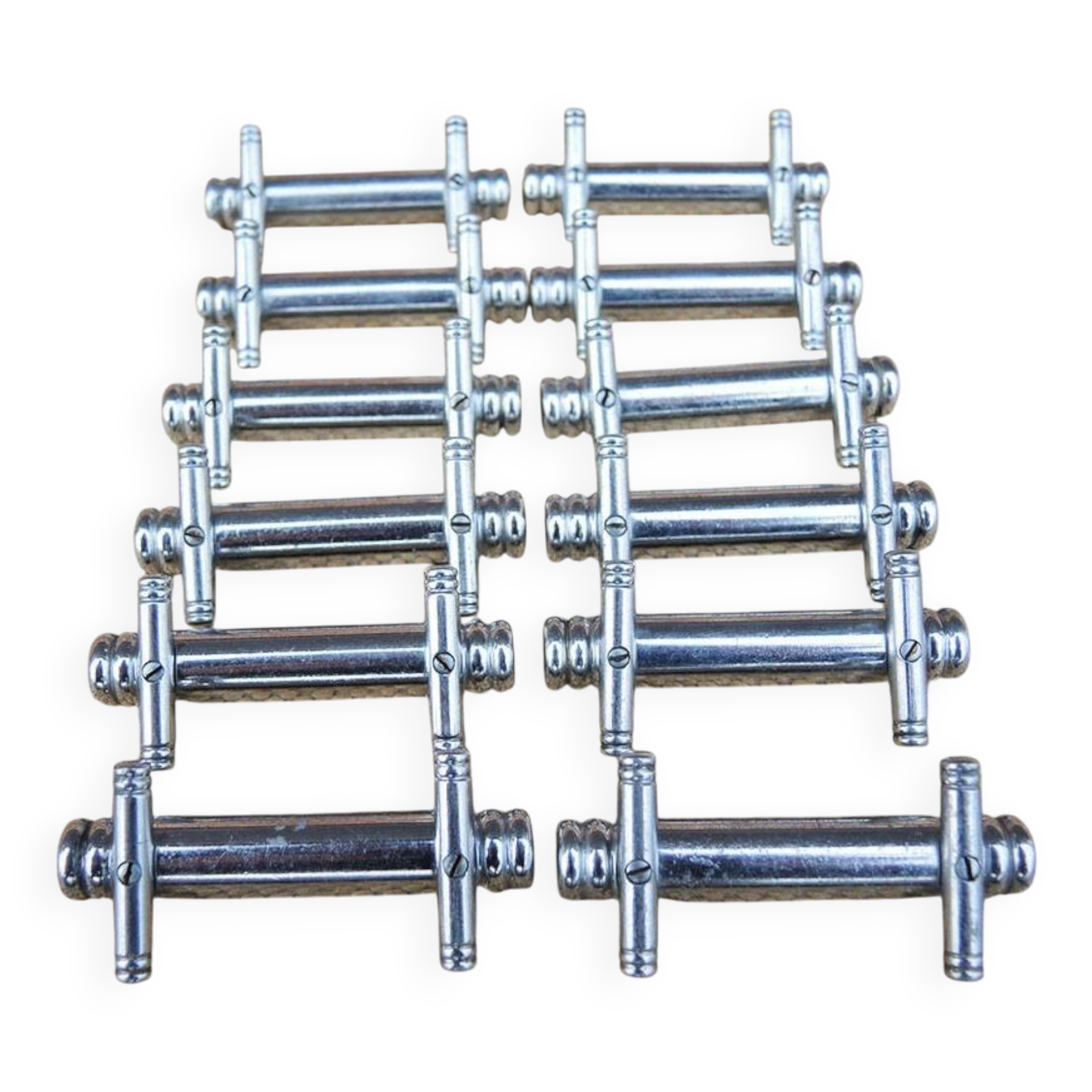 12 vintage Art Deco metal knife rests