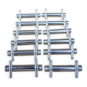 12 vintage Art Deco metal knife rests
