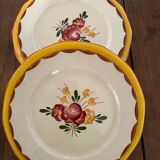 Flowered stamped dessert plates and matching ones.