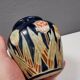 Small delicious blue ceramic vase with floral decoration. Sweden 1970s