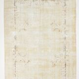 Faded beige classic vintage rug