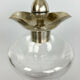 Blown glass carafe with silver frame and cap