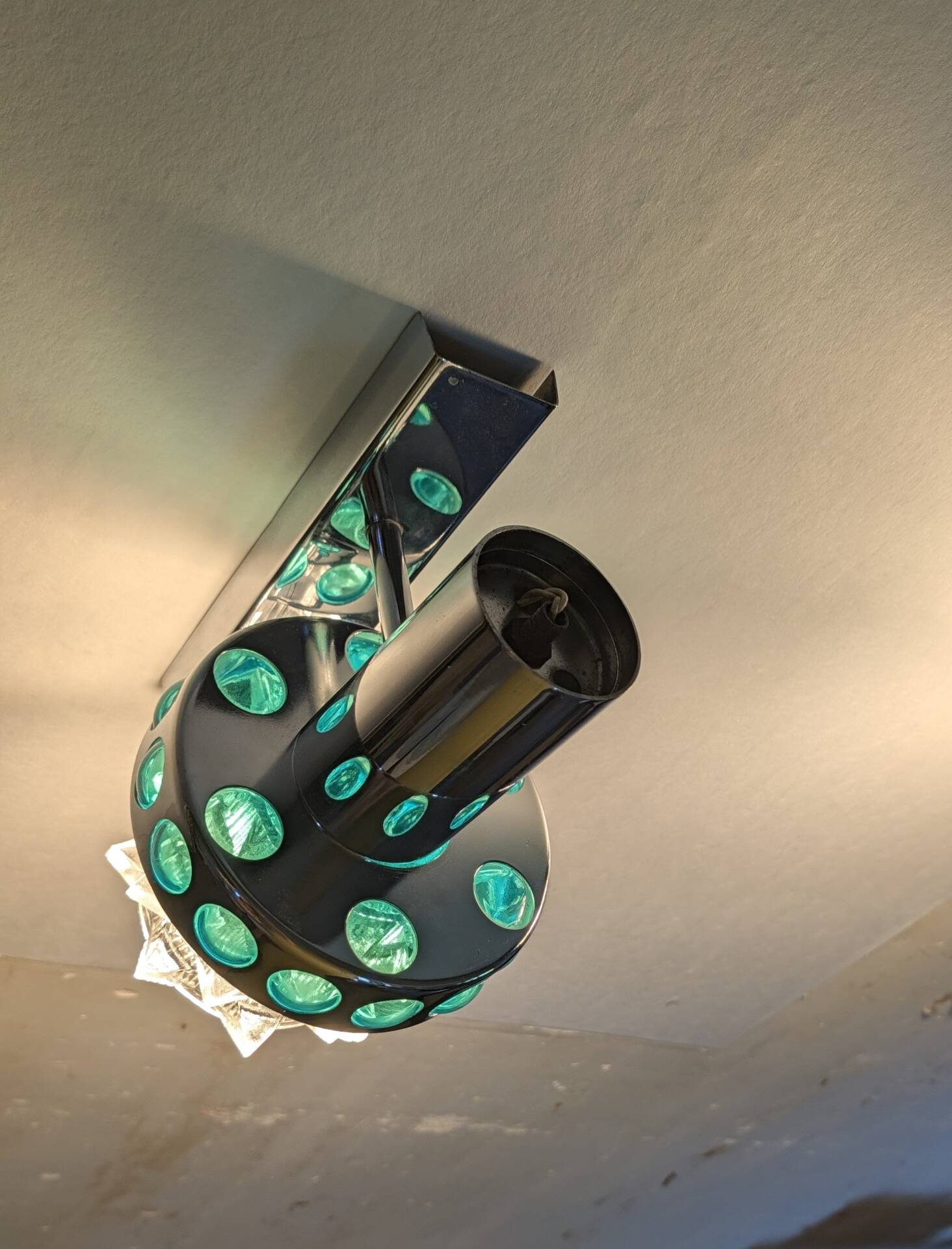 Pair of Space Age wall lights in chrome and green glass, 1970s.