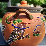 Antique decorative Japanese teapot in terracotta orange tones, with multico enamelled dragon decoration