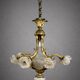 Rare and important gilded bronze chandelier with shells and roses.