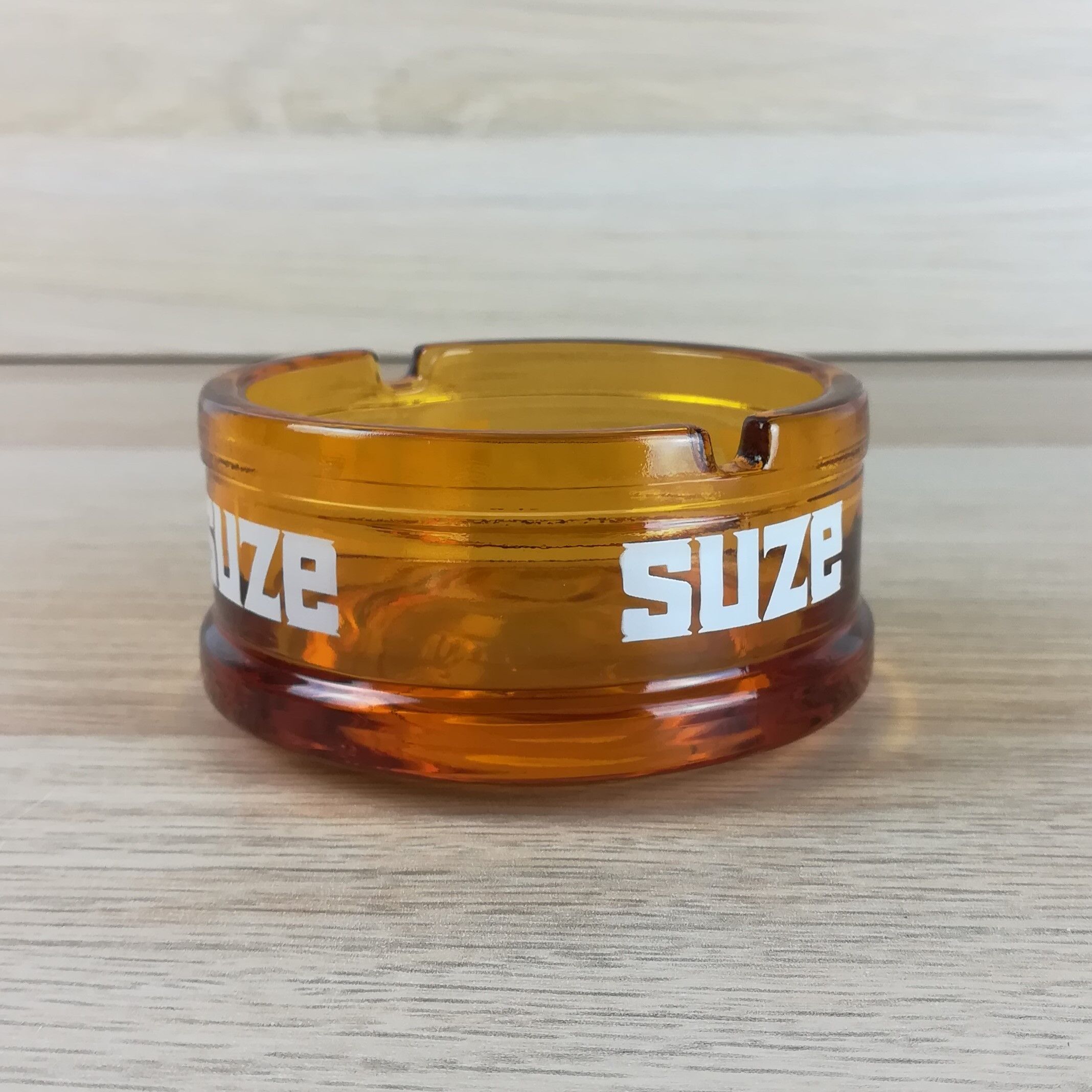 Advertising ashtray Suze