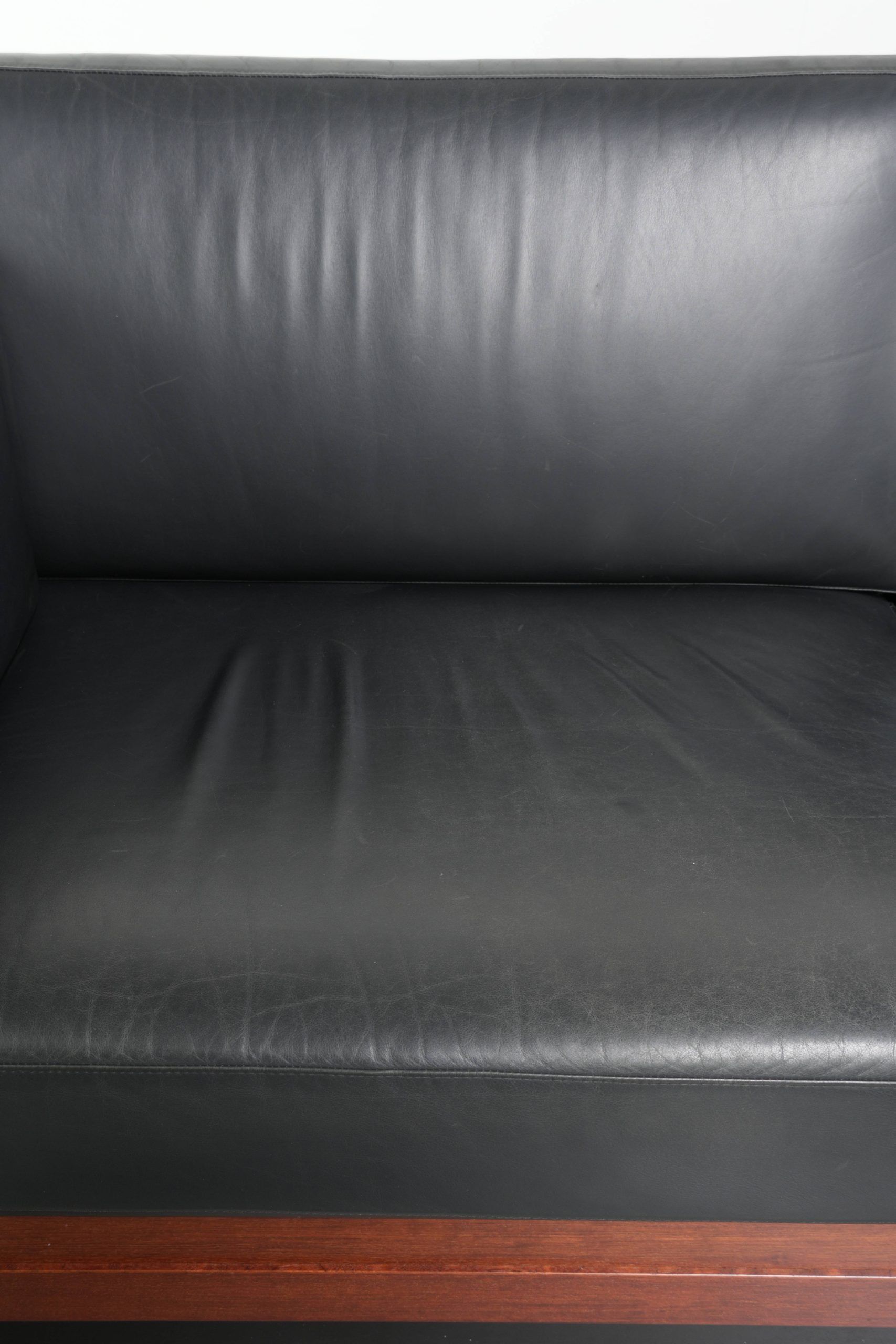 3-seater black cow leather sofa in timeless Art Deco design
