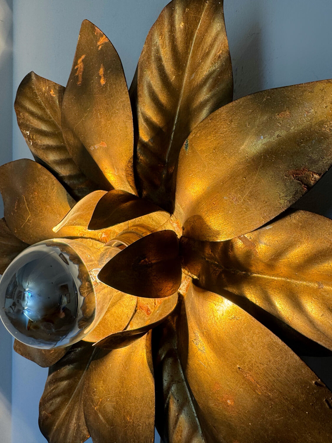 Golden flower wall light from the 70s