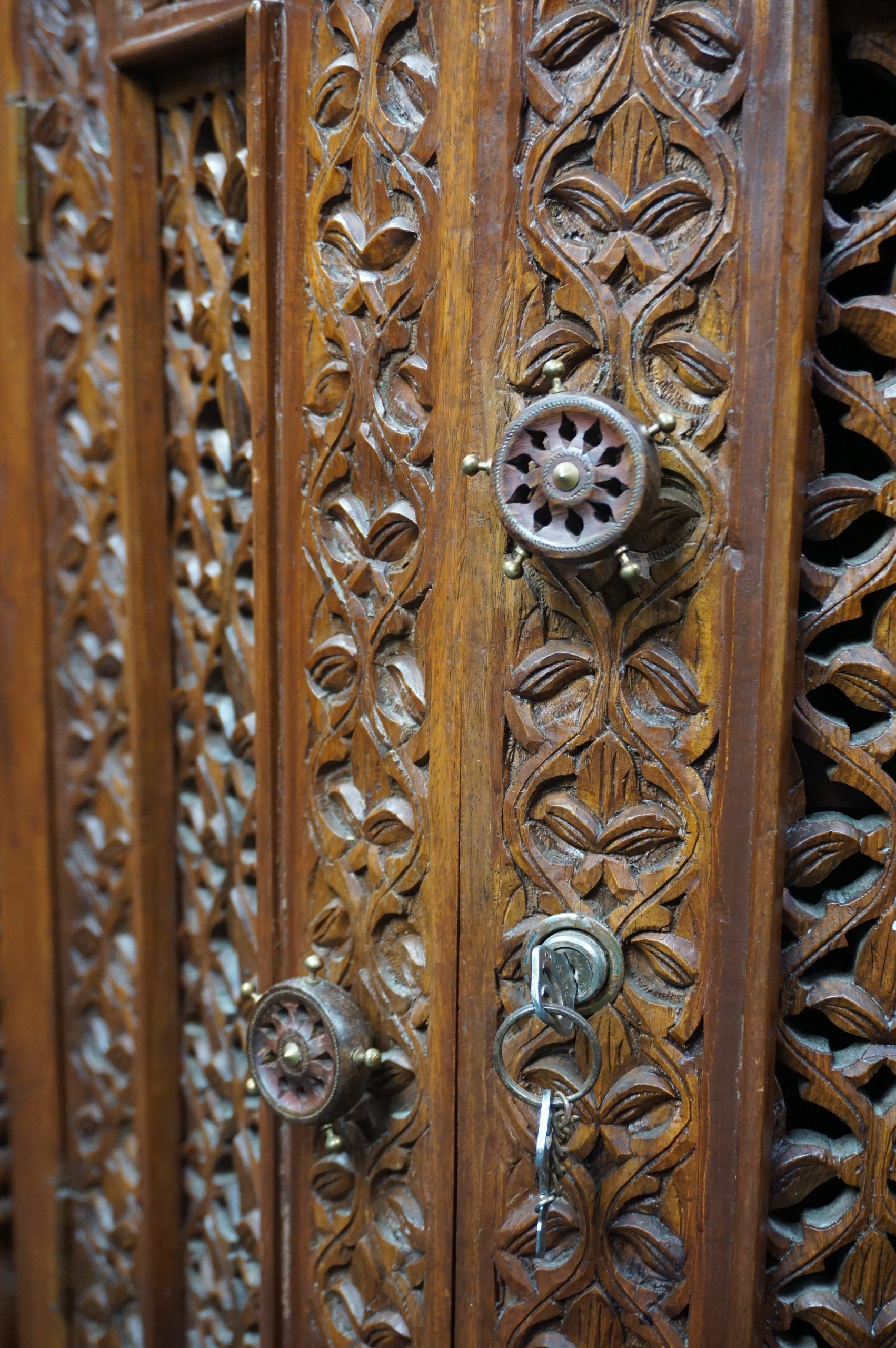 Carved wooden cabinet from the mid-20th century