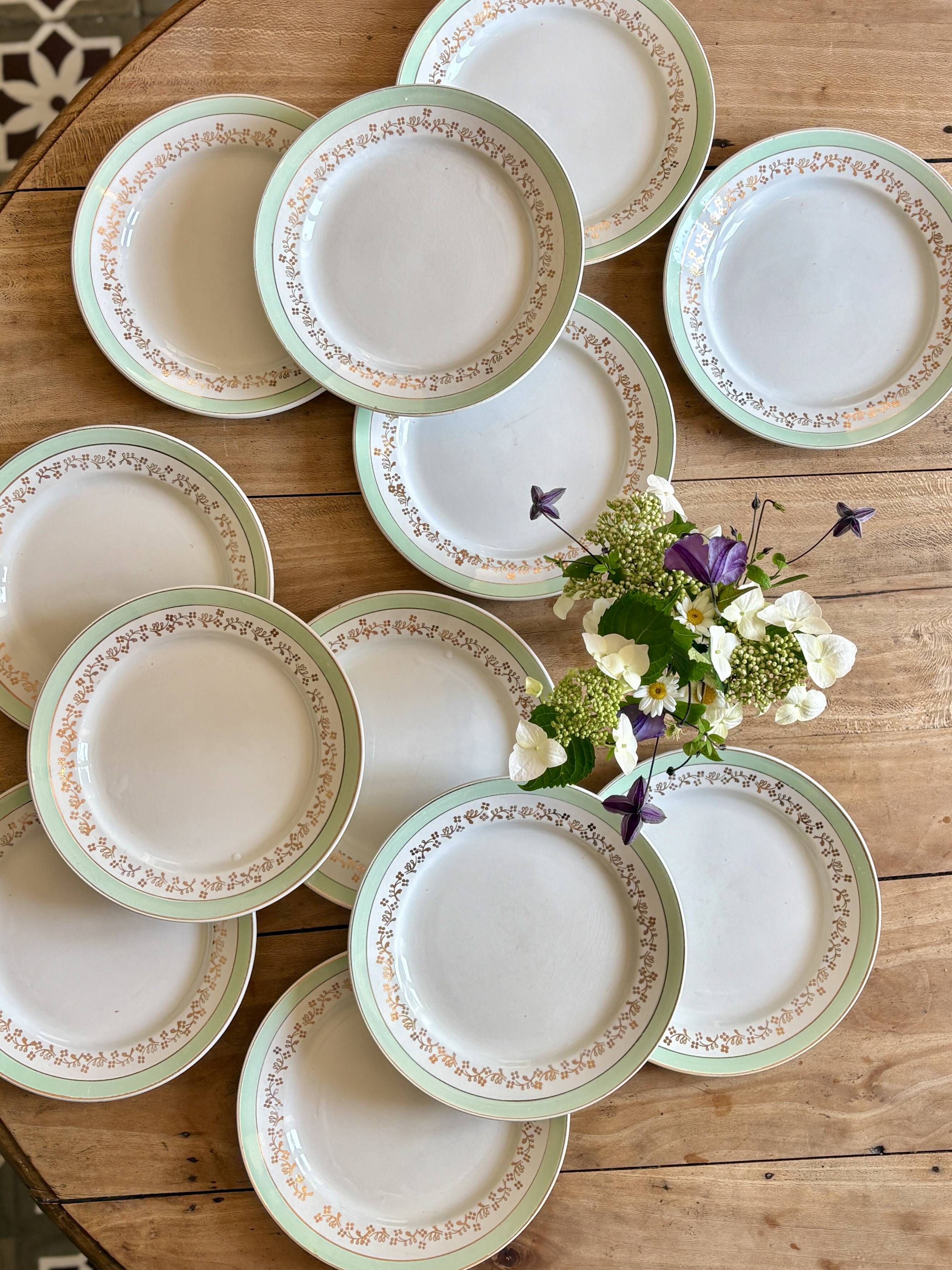 Set of 12 white, mint and gold flat plates, Mosèle de Lunéville