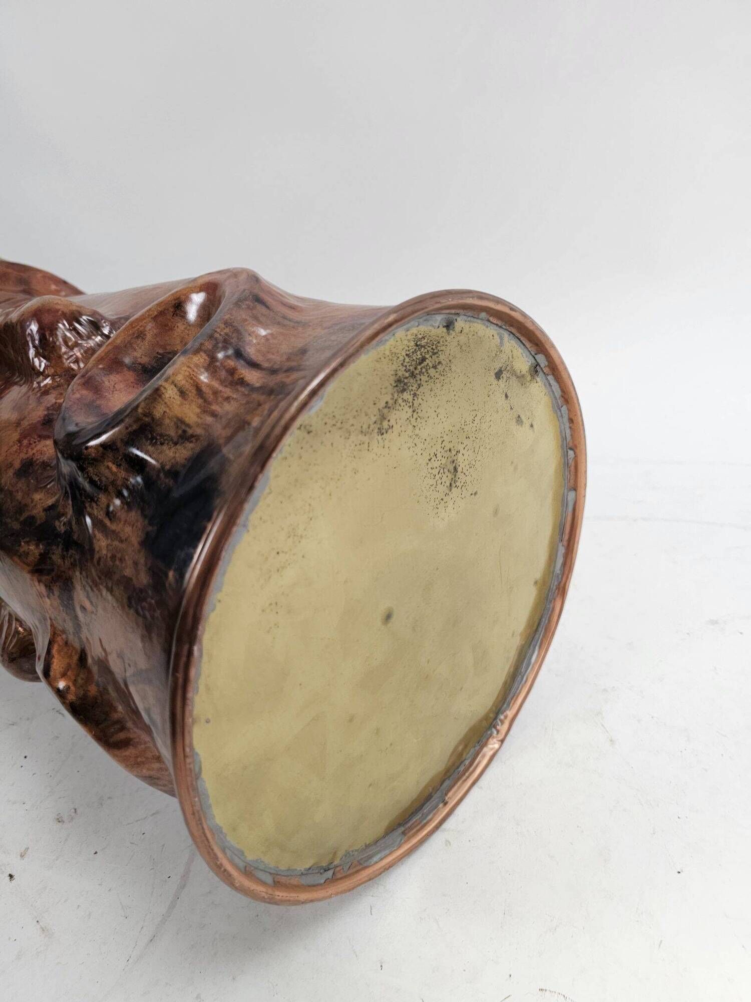 Sculptural copper umbrella stand with tribal faces, 1970s