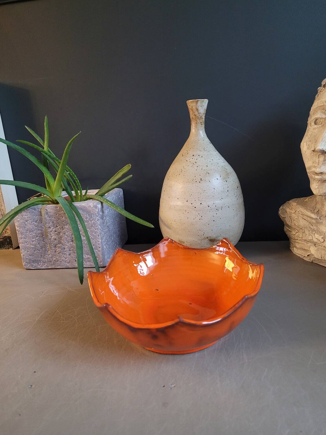 Orange ceramic star-shaped empty bowl
