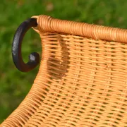 Wrought iron and rattan magazine/newspaper rack