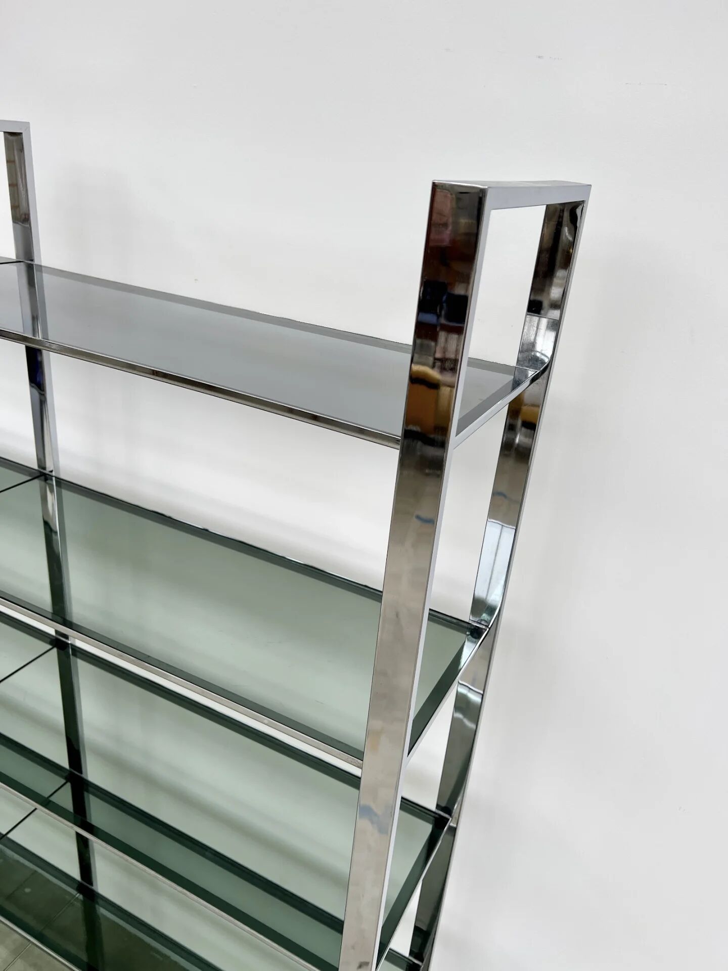 Chrome bookshelf with smoked glass — Italy, 1970s