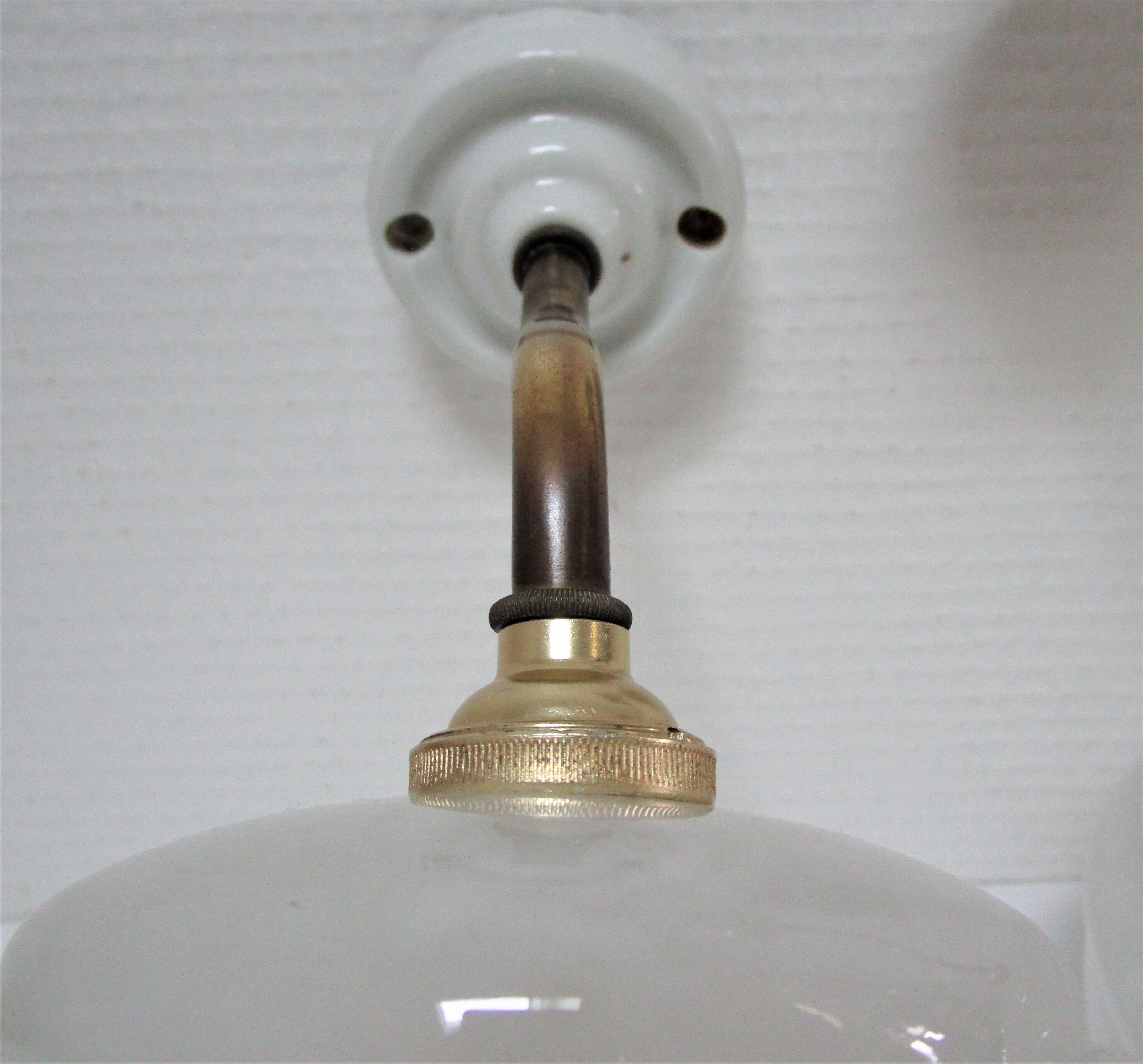 Pair of porcelain sconces brass glass of clchy white art deco