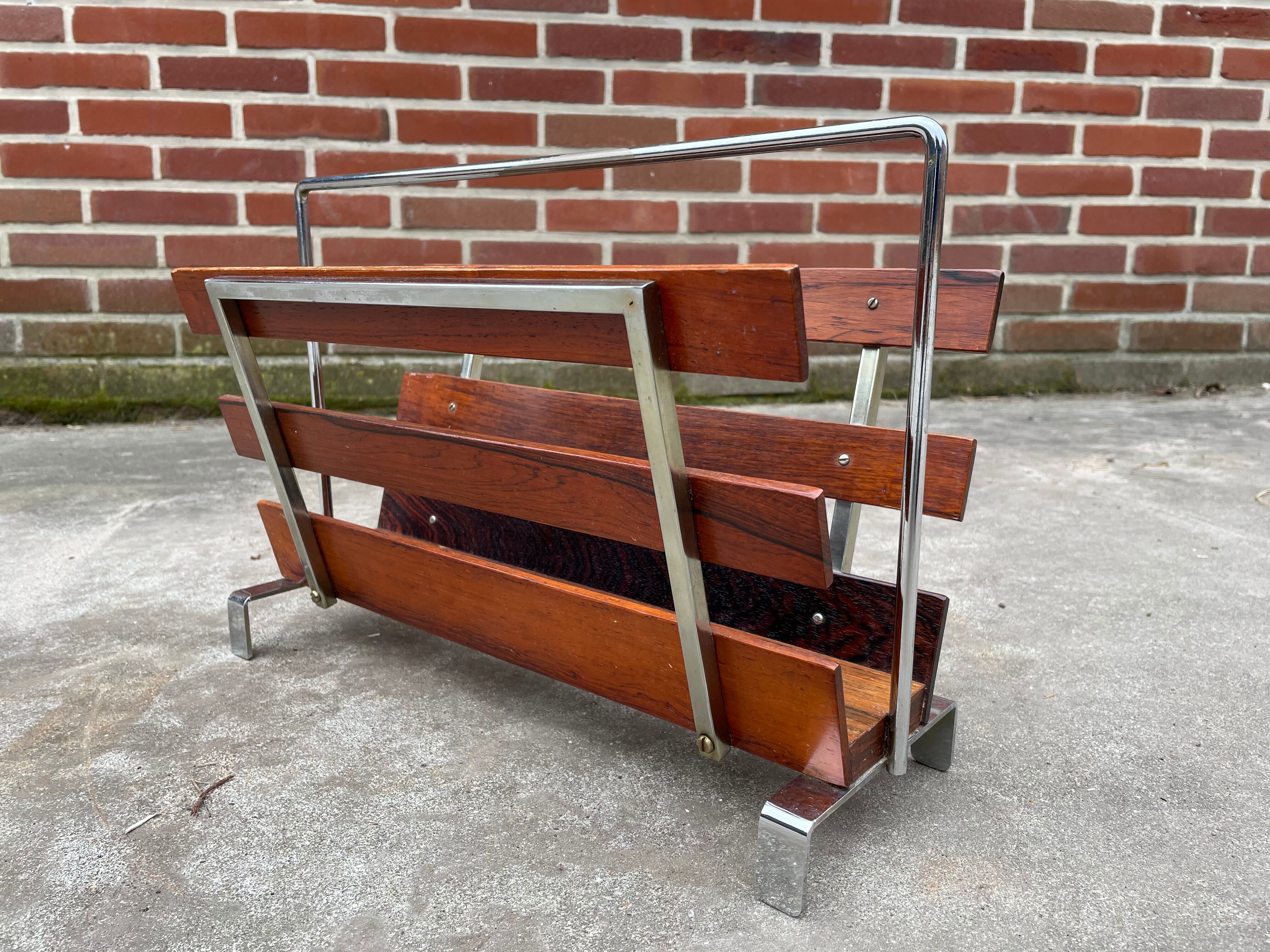 Vintage magazine rack from  rosewood and chrome design